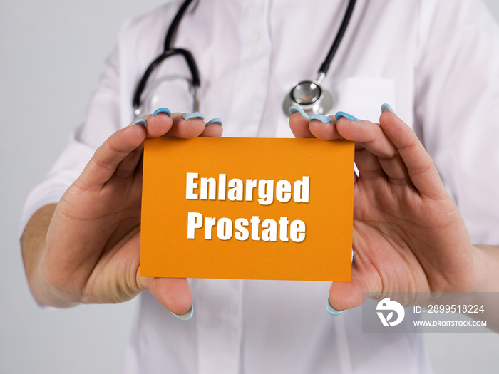 Medical concept about Enlarged Prostate with phrase on the piece of paper.