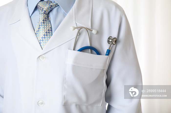 Doctor in medical gown with blue stethoscope, close up