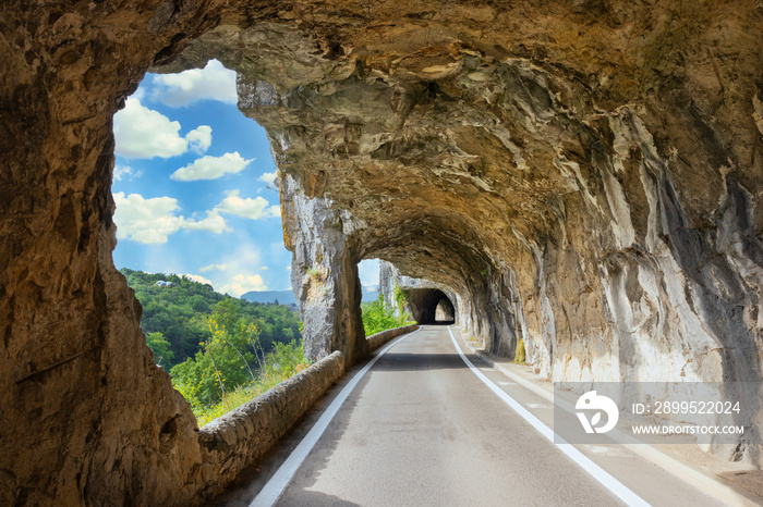 Famous road with arch in the rock called  defile de Ruoms  at Ruoms