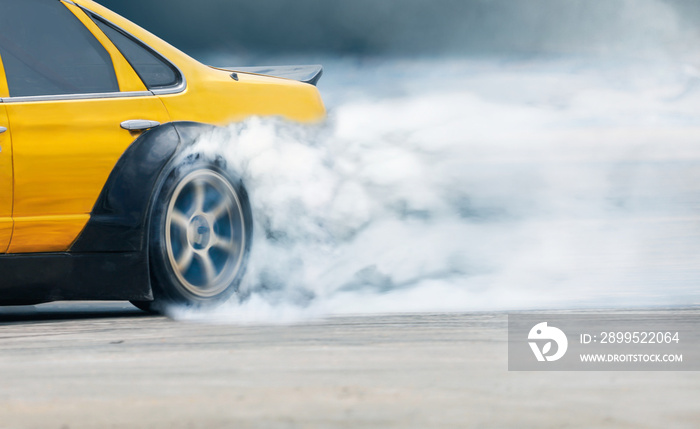 Race drift car burning tires on speed track