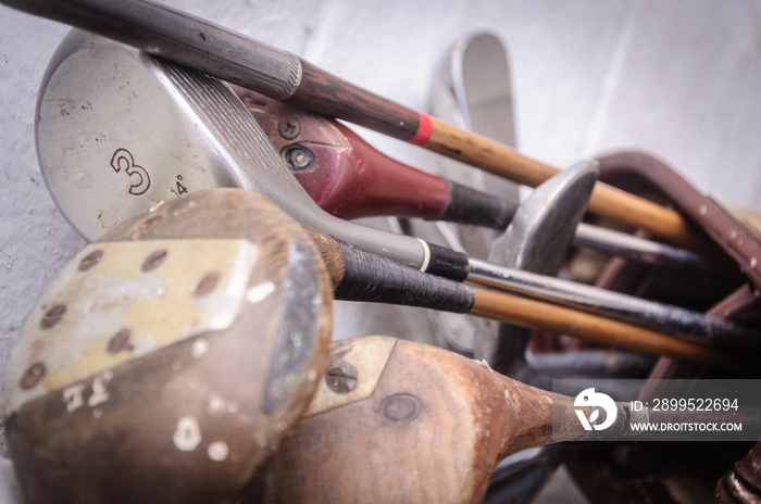 Vintage, worn out golf clubs