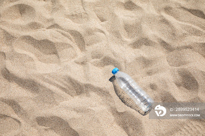 Empty plastic bottle at the beach