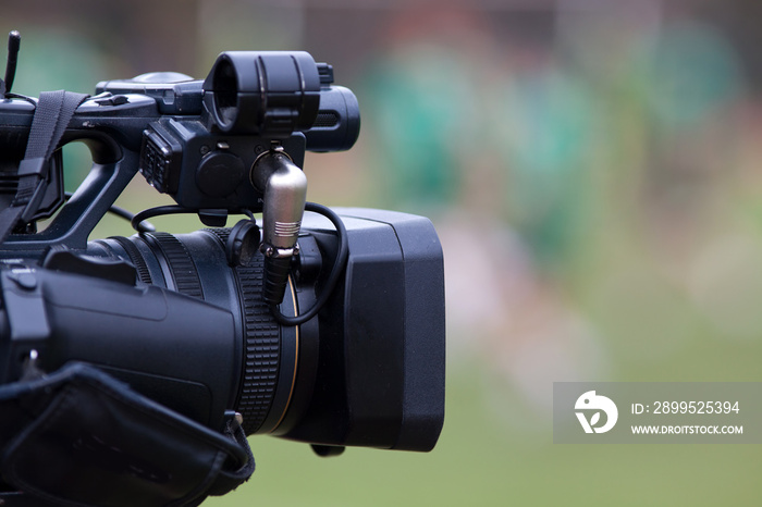 professional camera filming during sports event