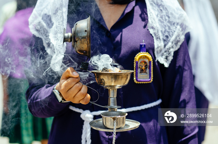 Female incense burners following the procession of the Lord of Miracles every October