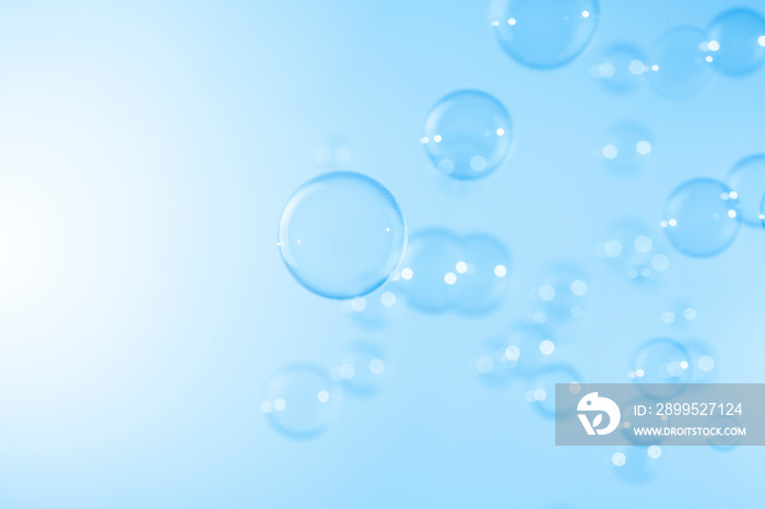 Transparent Blue Soap Bubbles Floating Texture Background.