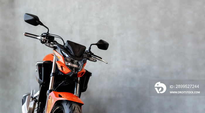 motorcycle bigbike in showroom with soft-focus and over light in the background