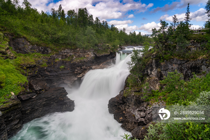 view of the Gaustafallet waterfall in northern Sweden