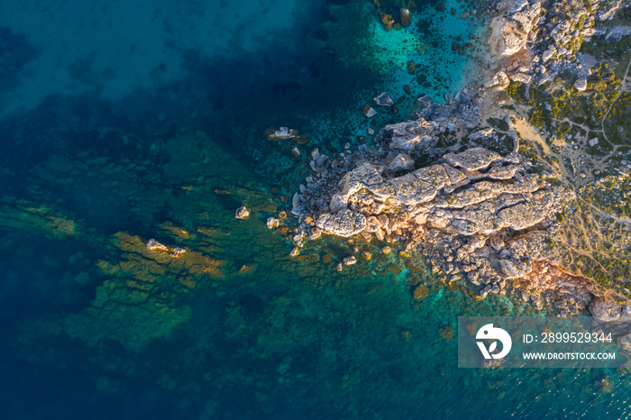 Rocks, cliffs in the sea. Aerial top view