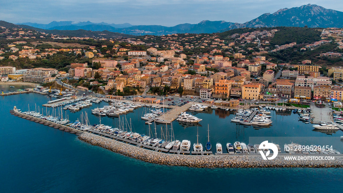 Aerial view of the marina of Propriano in the South of Corsica, France - Small coastal town in the Mediterranean Sea