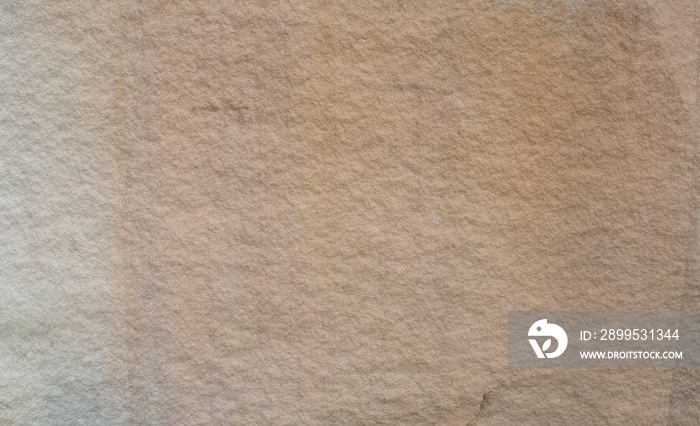 Neutral sandstone (sand stone) texture, seamless repeating pattern suitable for a wallpaper or background