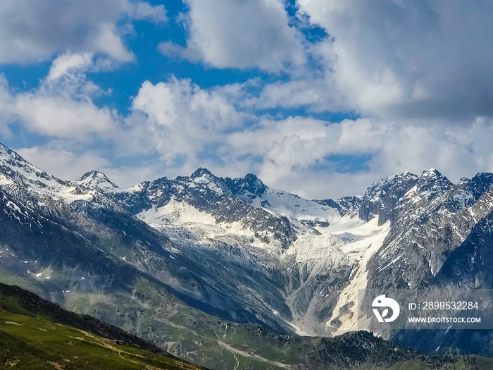 snowy black ski mountains clouds travel adventure pakistan