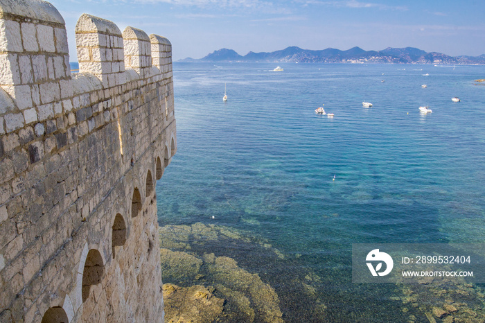 The ruins of Lérins Abbey overlook the azure ocean at Cannes