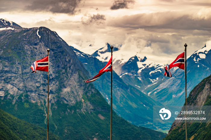 Norwegian flags and mountains landscape