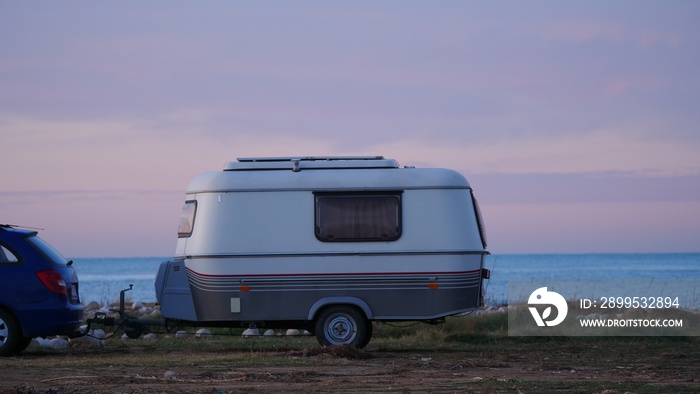 Caravan trailer camping on coast, Spain.