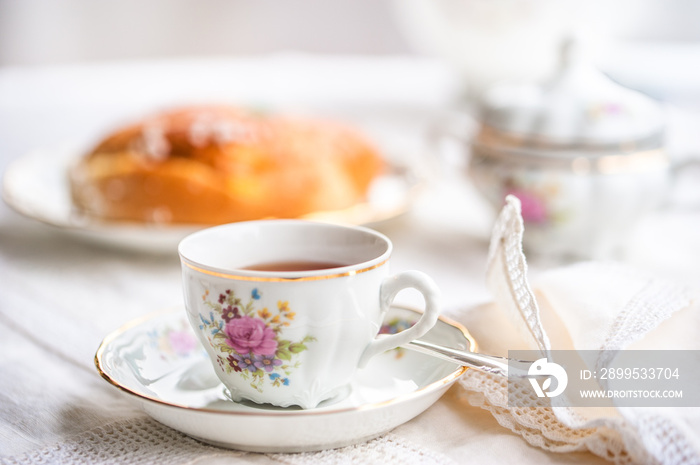 Luxury porcelain tea set with a cup, teapot, sugar bowl