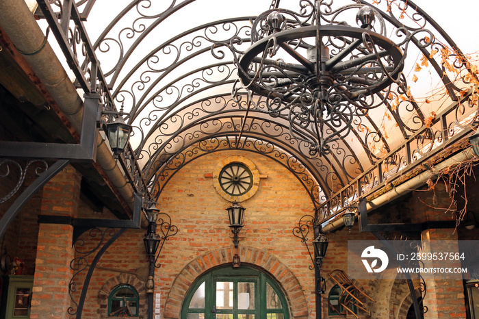 old iron chandelier and lanterns vintage