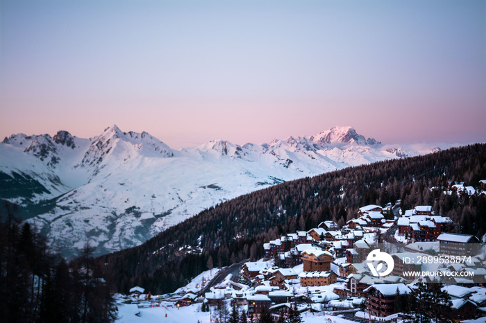 Sunset on a mountain La Plagne village in the French Alps in winter