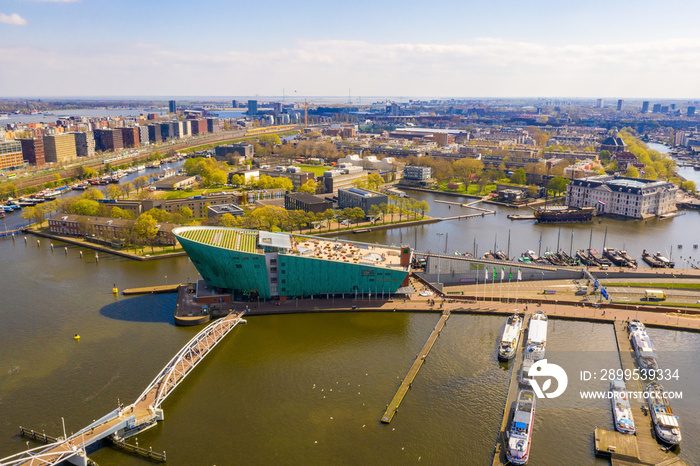 Aerial view of the Nemo Science Museum. The building is in the form of a green ship. Nemo was designed and renowned by Italian architect Renzo Piano.