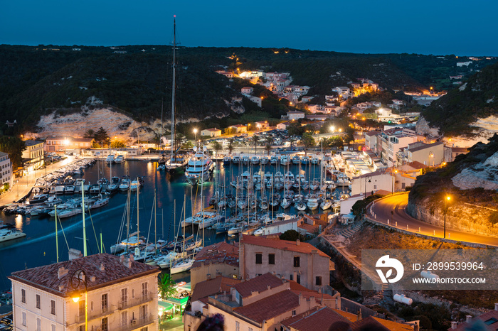 Marina at night, historic city of Bonifacio, Corsica island, France