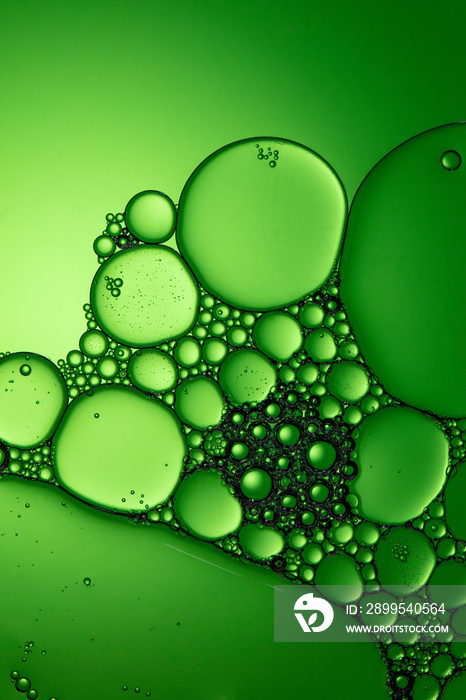 air bubbles in liquid green tone background