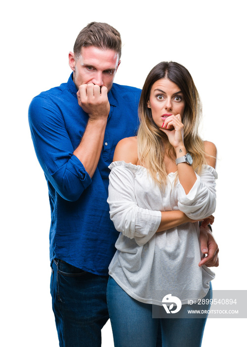 Young couple in love over isolated background looking stressed and nervous with hands on mouth biting nails. Anxiety problem.