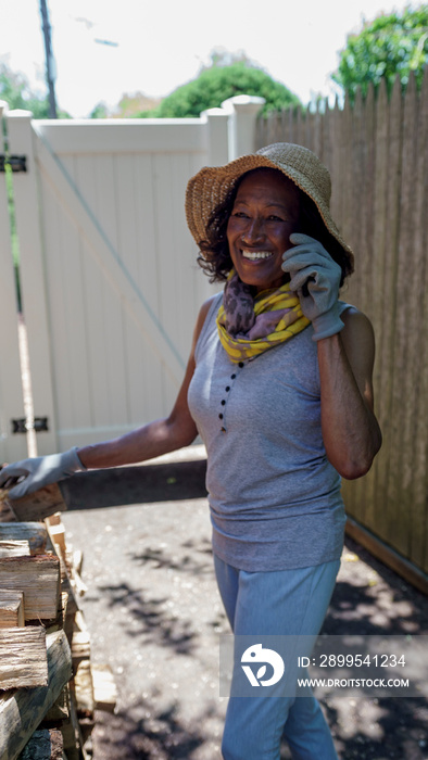 Senior woman talking on phone outdoors