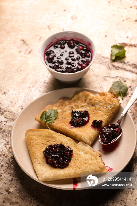 ruddy pancakes with blackcurrant jam