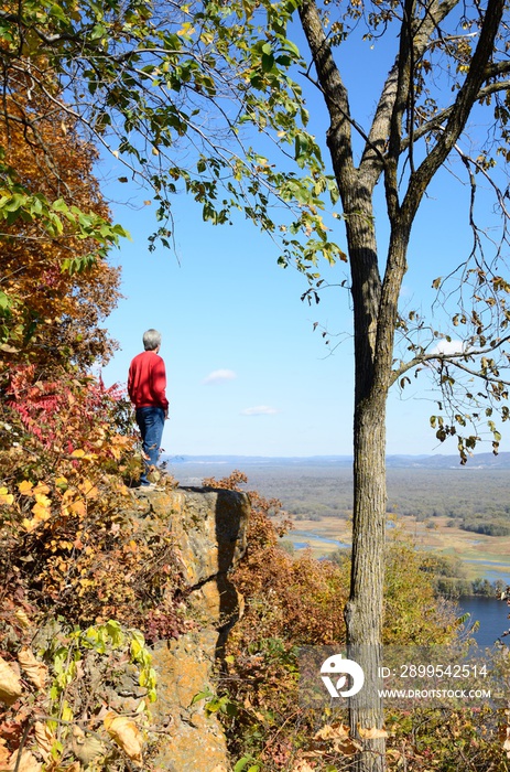 Man Standing on a Cliff Above the Mississippi River