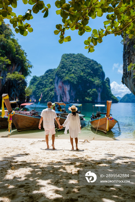 Couple on a boat trip to the Tropical lagoon of Koh Loa Lading Krabi Thailand part of Koh Hong