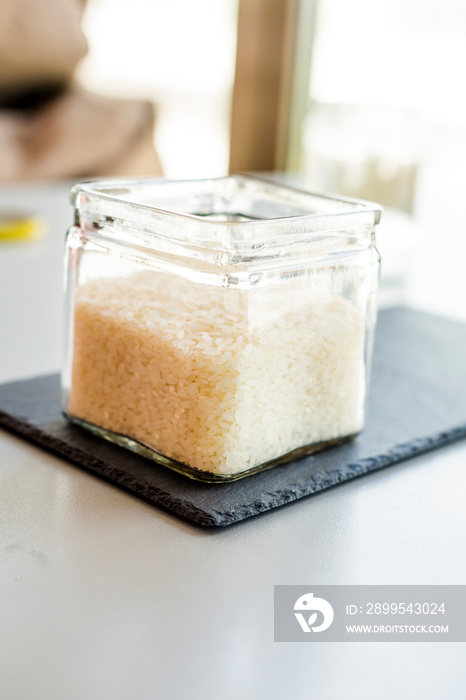 Raw rice on the table close up