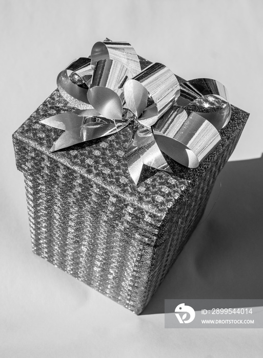 silver gift box with ribbon