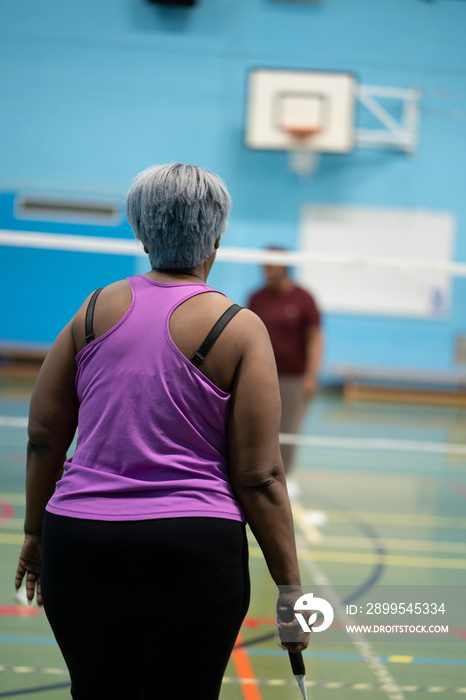 Woman playing badminton