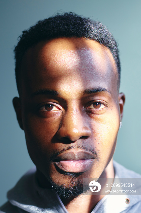 Portrait of mid adult man in sweatshirt