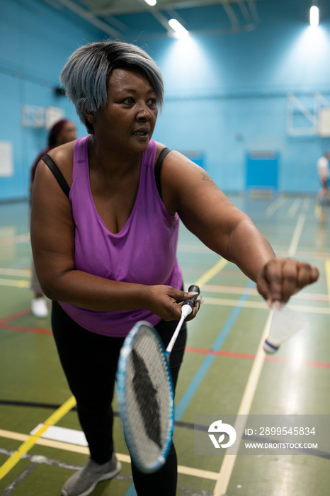 Woman playing badminton