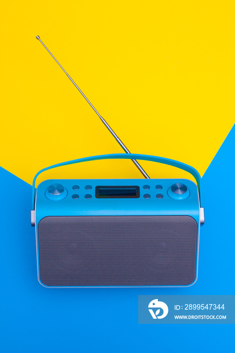 Top view on new digital blue radio,which it is stylized art retro style radio.