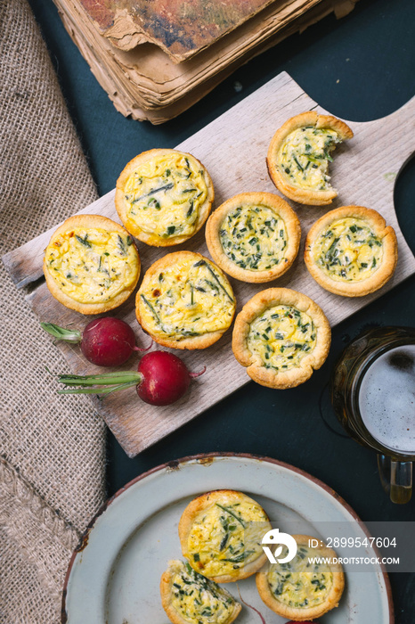 Mini quiches with wild asparagus and chives