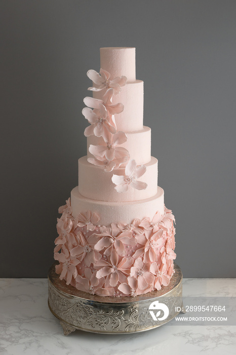 Trendy Pink Wedding Cake With Edible Flowers.