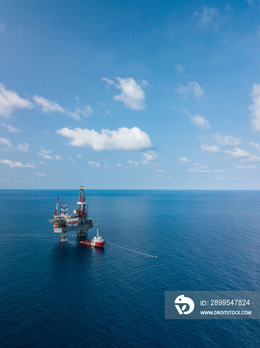 Aerial view from a drone of an offshore jack up rig at the offshore location during day time