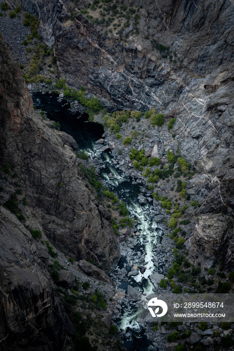 Dark Waters of The Gunnison River Rush White In The Canyon Below