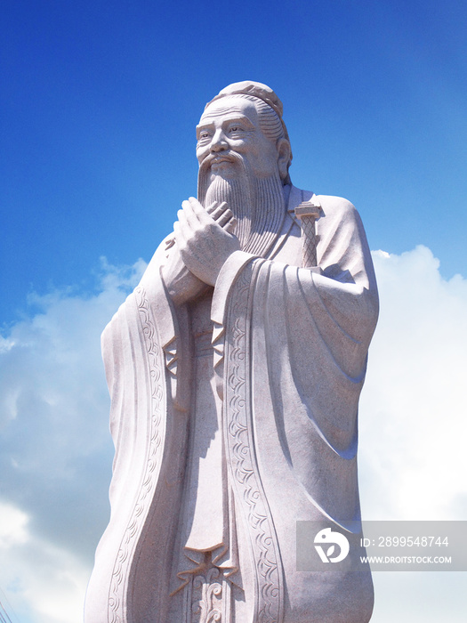 Confucius statue with sky background