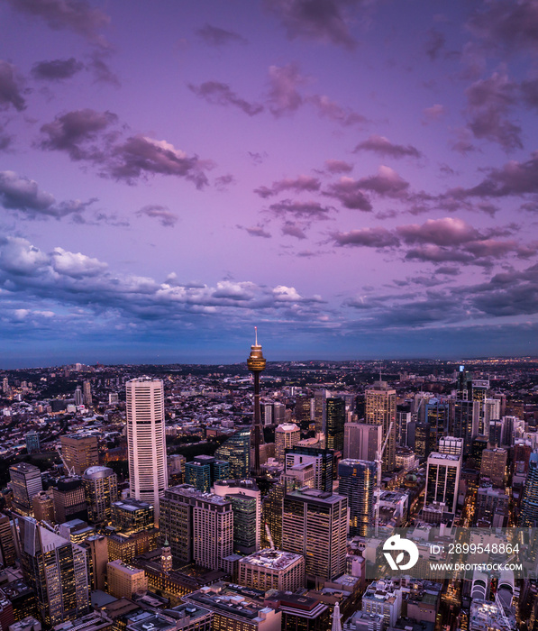 Tall buildings in the city and in the evening from above