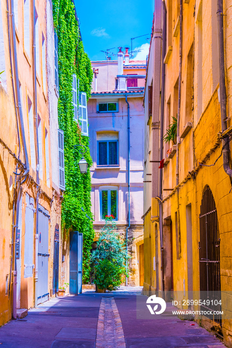 a narrow street in the center of Aix-en-Provence, France