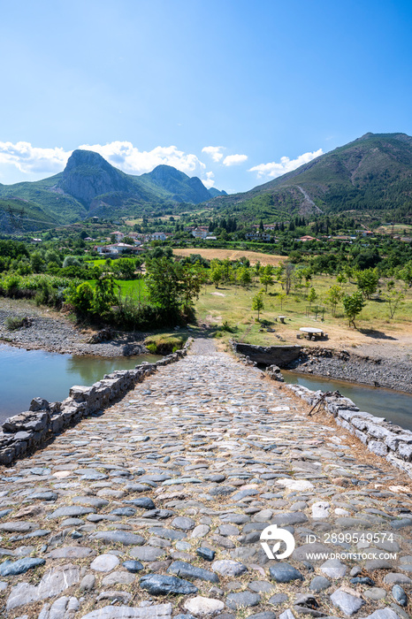 old stone bridge in ancient roman road over the Shkumbin river Albania