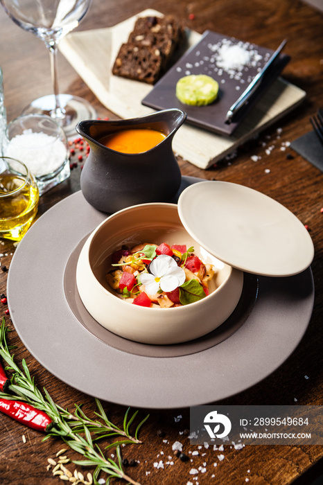 Bouillabaisse, Octopus, blue mussels, tuna, king prawns, Scottish salmon. Delicious healthy French traditional food closeup served for lunch in modern gourmet cuisine restaurant