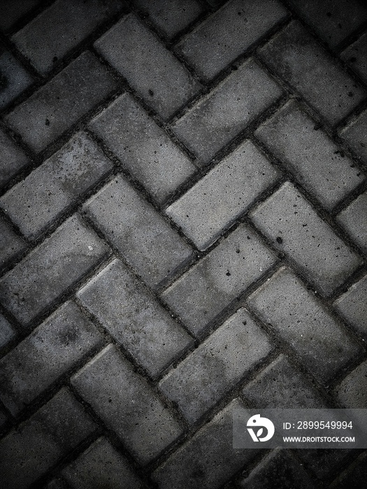 top view on gray paving slabs texture may used as background with copy space