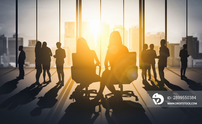 Double exposure image of many business people conference group meeting on city office building in background showing partnership success of business deal. Concept of teamwork, trust and agreement.