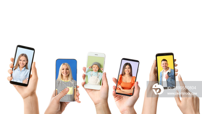 Group of people with mobile phones taking photo on white background