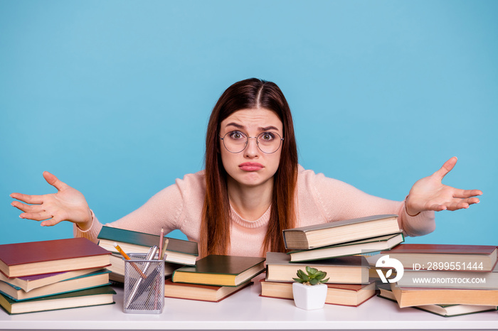 Portrait of her she nice attractive ignorant illiterate doubtful girl preparing exam test subject university 1-September at work place station isolated over bright vivid shine blue background