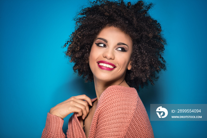 African american girl posing in studio.