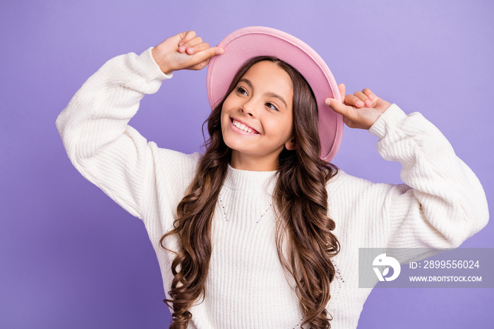 Photo of brunette long hairdo pretty girl hands cap wear sweater isolated on violet color background